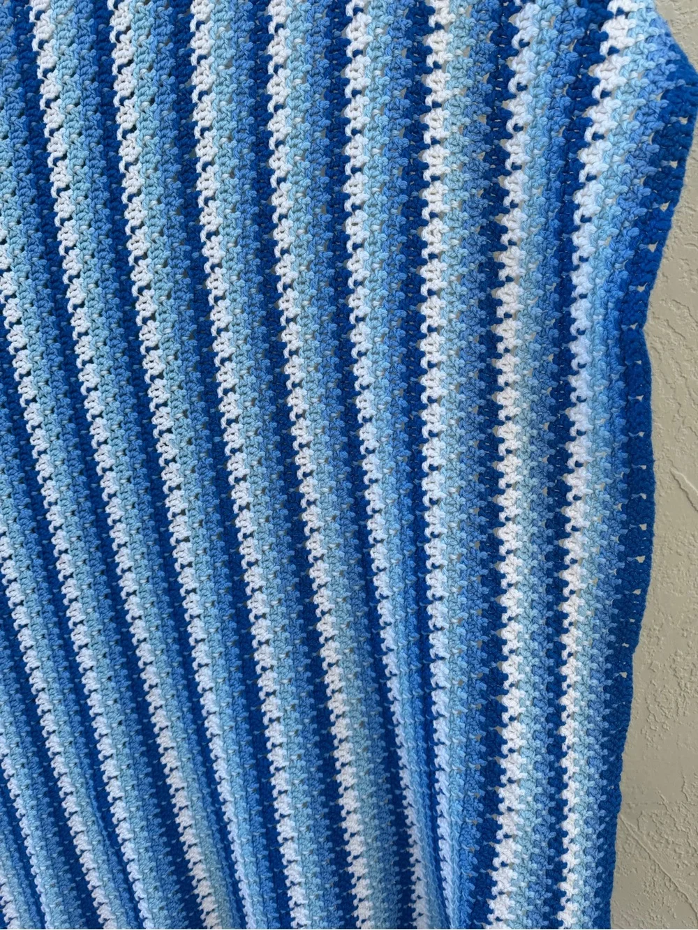 Handmade pilling white afghan